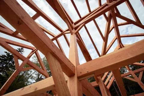 Precision-cut timber joinery in a cut-and-shipped kit