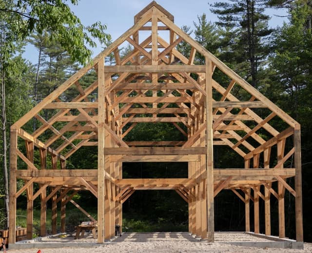 Traditional timber frame barn in rough-sawn pine